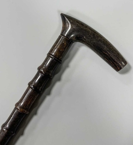 A sectional walking cane, possibly rhino horn, early 20th century,