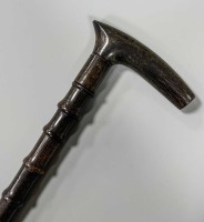 A sectional walking cane, possibly rhino horn, early 20th century,
