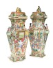 A pair of Chinese Canton vases and covers, Qing Dynasty, mid-19th century,