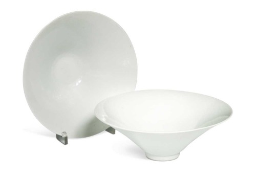A pair of Chinese white glazed "hidden decoration" floral bowls, 18th century,