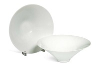 A pair of Chinese white glazed "hidden decoration" floral bowls, 18th century,