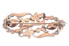 An Early to Mid-19th century gem-set brooch, of floral design; the openwork surround with stylised foliate and flowerheads, set with rose-cut diamond points, highlighted with two pear-cut pink paste in cut-down mounts, brooch fittings to the reverse with - 2