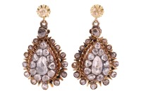 A pair of rose-cut diamond cluster drop earrings; the closed-back teardrop pendants with a cluster of rose-cut diamonds, claw-set within a frame of graduated rose-cut diamonds, on a later-added surmount featuring a rose-cut diamond in buttercup mount, ear
