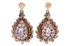 A pair of rose-cut diamond cluster drop earrings; the closed-back teardrop pendants with a cluster of rose-cut diamonds, claw-set within a frame of graduated rose-cut diamonds, on a later-added surmount featuring a rose-cut diamond in buttercup mount, ear