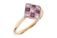 A ruby and diamond panel ring, the square ring head set with five round brilliant-cut diamonds, and four square table-cut rubies, in pierced floral gallery, between tapered shoulders to a D-profile shank, yellow metal stamped '18ct', ring head 1.2 cm wide