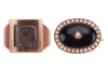 An early 19th century mourning ring, with plaited hair behind the central glass compartment, engraved to the interior: &lsquo;John Hinsum, 26 May, 1802, At 60&rsquo;, in a rose metal mount, surface tested as 9ct, size Q, together with a Victorian onyx and seed pearl 