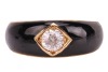 An enamel and diamond Gypsy ring, the central old-cut diamond with an estimated weight of 0.40ct, bead-set to a square mount on a black enamel ground, yellow metal stamped '18', size M, 6.0 grams. 4.5 x 4.5 x 2.9mm