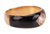 An enamel and diamond Gypsy ring, the central old-cut diamond with an estimated weight of 0.40ct, bead-set to a square mount on a black enamel ground, yellow metal stamped '18', size M, 6.0 grams. 4.5 x 4.5 x 2.9mm - 3