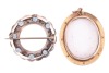 Two brooches; comprising an aquamarine and split pearl wreath-style brooch, with millegrain detailing, in a white metal mount marked &lsquo;9ct&rsquo;, with brooch pin fitting to the reverse, together with a white enamel oval locket, with glass compartment, the glass - 2