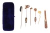 A group of gem-set stick pins; to include an example of an old-cut diamond in buttercup mount, one set with moss agate, another one with rose-cut diamond point, together with a 9ct yellow gold tie clip; total weighable 11.6 grams. - 3