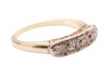 A five-stone diamond ring, comprising five graduating old-cut diamonds, the stones collet-set, the setting further highlighted with rose-cut diamonds, to a yellow metal ring shank of D-profile, marked &lsquo;585&rsquo;, size P &frac12;, 4.0 grams. Centre Diamond measuring a - 3