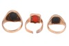 Three signet rings; the first set with an oval bloodstone plaque of 15.3 x 11.5 mm, and another similar example set with a rounded oblong bloodstone plaque of 11.8 x 10.00 mm, both in yellow gold with British hallmarks for 9ct, ring sizes U 1/2 and P, com - 2