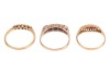 Three rings; comprising a diamond-set five-stone ring, with five graduated single-cut diamonds, in a yellow metal mount marked &lsquo;18ct&rsquo;, size O, a sapphire and diamond-set half hoop ring, in a 9ct yellow gold mount, size O, and a paste and diamond-set ring, - 2