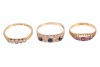 Three rings; comprising a diamond-set five-stone ring, with five graduated single-cut diamonds, in a yellow metal mount marked &lsquo;18ct&rsquo;, size O, a sapphire and diamond-set half hoop ring, in a 9ct yellow gold mount, size O, and a paste and diamond-set ring, - 3