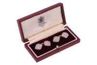 A pair of Edwardian carved chalcedony cufflinks, of square form, carved with reeded design, centred with an old European-cut diamond in millgrained collet, estimated total weight 0.16ct for the pair, chain fittings in yellow metal marked '18ct PL', 1.1 cm