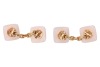 A pair of Edwardian carved chalcedony cufflinks, of square form, carved with reeded design, centred with an old European-cut diamond in millgrained collet, estimated total weight 0.16ct for the pair, chain fittings in yellow metal marked '18ct PL', 1.1 cm - 3