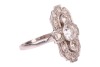 An early 20th-century diamond-set plaque ring; composed of three central bezel-set old-cut diamonds, the largest measuring approximately 6.1mm with an estimated carat weight of 0.85ct, flanked by two old-cut diamonds measuring approximately 3mm each, in a - 3
