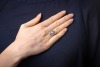 An early 20th-century diamond-set plaque ring; composed of three central bezel-set old-cut diamonds, the largest measuring approximately 6.1mm with an estimated carat weight of 0.85ct, flanked by two old-cut diamonds measuring approximately 3mm each, in a - 5