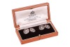 Krementz - a pair of rock crystal and split pearl cufflinks; the round and frosted rock crystal panels with carved radiating patterns, in a millgrained frame with foliate and black enamel details, centred with an applied split pearl, bar link connections - 2