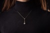 A French Belle &Eacute;poque old-cut diamond lavalier necklace, with an estimated total diamond weight of 2.50ct, consisting of a pear-shaped old-cut diamond in claw-setting, suspending from a tapered and articulated bar with millgrain details set with a row of - 2