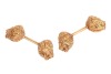 Lalaounis - a pair of lion head cufflinks, of dumbbell form, the bar terminated with a sculpted lion head on both ends, in yellow metal stamped '750', with Lalaounis maker's mark, 3.5 cm, 18.4 grams. - 2