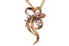 A Modernist diamond-set floral pendant on chain, by Cropp & Farr, the applied foliate motif centred with a round brilliant-cut diamond cluster, with leaves adorned with single-cut diamonds, on a stylised bow mount with beaded textures, London 1973, 5.0 cm - 2