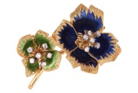 A floral brooch set with diamonds and enamel, comprising two stylised flowerheads with textured petals, embellished with blue and green transparent enamel, stamens claw-set with round brilliant-cut diamonds, with an estimated total weight of 0.85ct, brooc