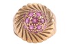 A ruby-set dress ring, featuring a central raised domed cluster of nineteen claw-set round-cut rubies, the domed cluster tapering to a border detailed with diagonal fluting, the diagonal fluting extending to the shoulders, to a plain yellow metal band sur - 2