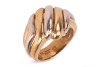 A two-tone dress ring in 18ct gold, of diagonally fluted design, bearing British import marks, size N, 8.8 grams.