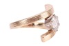A diamond solitaire ring, of Modernist-style crossover design, composed of a round brilliant diamond measuring approximately 7.25mm with an estimated carat weight of 1.49ct, in a six-prong setting, to a crossover mount, with textured design, hallmarked 18 - 2