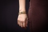A gem-set bracelet of floral design, centred with a stylised flowerhead set with circular-cut sapphires and diamond accents, to a woven chain of wickerwork pattern, completed with a concealed lever clasp, centrepiece stamped '800 and 585', chain bearing B - 4
