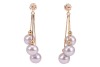 Two pairs of earrings; to include a pair of tassel earrings with cultured pearl drops, on fine serpent links to a beaded surmount with peg and butterfly fittings, in yellow metal stamped '14K', 3.5 cm drop; and another pair of stud earrings of trefoil des - 3