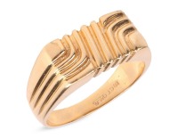 A Modernist ring; the rectangular ring head consisting of textured grooves in a wave design, to a tapering flat shank, in yellow metal marked '18ct', ring size T, ring head measures 1.6 x 0.9 cm, total weight of item 8.58 grams.