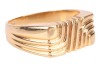 A Modernist ring; the rectangular ring head consisting of textured grooves in a wave design, to a tapering flat shank, in yellow metal marked '18ct', ring size T, ring head measures 1.6 x 0.9 cm, total weight of item 8.58 grams. - 3