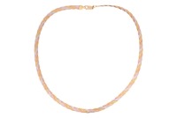 A tri-coloured braided necklace, consisting of three intertwined herringbone chains with patterned textures, completed with a lobster clasp, Italian marks for 18ct, overall length 42.0 cm, 12.4 grams.
