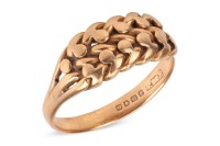 A braided ring in 18ct yellow gold, of woven design leading to tapering shank, London 1919, size S&frac12;, 5.4 grams.