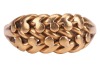 A braided ring in 18ct yellow gold, of woven design leading to tapering shank, London 1919, size S&frac12;, 5.4 grams. - 2