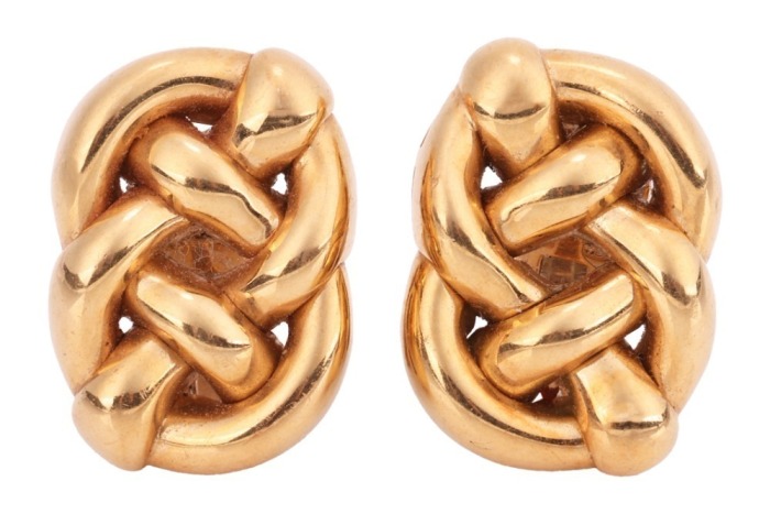 A pair of double knot earrings, measuring approximately 22mm x 16mm, with post fittings and ear clips to the reverse, with Italian marks for 18ct; 18.9 grams