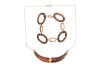 A tiger's eye necklace and a bracelet; the necklace comprising a hinged tiger's eye pendant carved as a twisted horn, with applied stripe decorations, on a fine cable link chain with spring-ring clasp, in yellow metal struck with Italian assay marks for 1