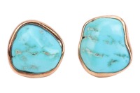 A pair of turquoise-set earrings, with irregular-shaped polished turquoise, bezel-set in yellow metal mounts, with ear clips to the reverse, surface tested as 9ct; 6.5 grams Please note: Unless otherwise stated, lots have been tested using an electronic t