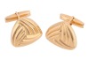 A pair of triangular cufflinks of reeded design, fitted with swivel backs, unmarked yellow metal surface testing as 18ct, cufflink motif measures 2.4 cm across, total weight of item 46.85 grams. Please note: Unless otherwise stated, lots have been tested 