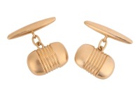 A pair of oblong cufflinks, with reeded details at the centre, fitted with linked torpedo backs, yellow metal marked '18ct', total weight of items 9.20 grams.