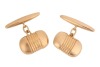 A pair of oblong cufflinks, with reeded details at the centre, fitted with linked torpedo backs, yellow metal marked '18ct', total weight of items 9.20 grams.