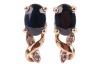 A small group of jewellery; The first piece a synthetic colour-change sapphire ring, in a six-claw setting, to a yellow metal ring shank surface testing as 18ct, N &frac12;, 6.5 grams; The second a pair of paste and cubic zirconia floral cluster ear studs, to po - 3