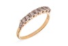 A diamond-set half hoop ring, claw-set with seven single-cut diamonds, to a bi-colour metal mount marked &lsquo;18ct&rsquo; and &lsquo;Plat&rsquo;, size Q; 2.3 grams