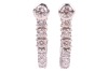A pair of diamond-set semi-hoop earrings, comprising bezel-set round brilliant diamonds at the surmounts, each with an estimated carat weight of 0.25ct, fixed to a curved row of claw-set diamonds, graduated in size, in 18ct white gold mounts, with post fi