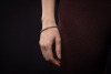 A diamond line bracelet, comprising fifty-two round brilliant-cut diamonds, each measuring approximately 2.8mm x 1.7mm, with an estimated total carat weight of 4.16ct, each stone in a four claw setting and connected by articulated links, bracelet measurin - 4