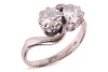 A diamond-set toi et moi ring, composed of two round brilliant diamonds, measuring approximately 5.8mm, with an estimated total carat weight of 1.50ct, claw-set in a crossover design, in an 18ct white gold mount, size N1/2; 5.0 grams