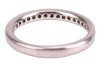 A diamond-set half-eternity ring, featuring a channel of nineteen round brilliant-cut diamonds, set in platinum, size J, 3.5 grams. - 4