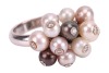 A pearl and diamond-set cluster ring, composed of cultured pearls of various body colours, each bezel-set with a round brilliant diamond, with attached jump rings connected to a court-shaped 18ct white gold shank, size L; 9.0 grams - 3